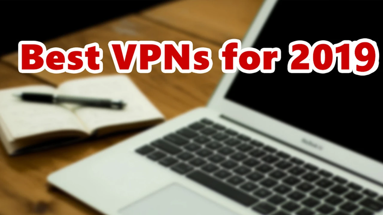 overhead view of corned beef sliced and on a platter with cabbage, potatoes, and carrots