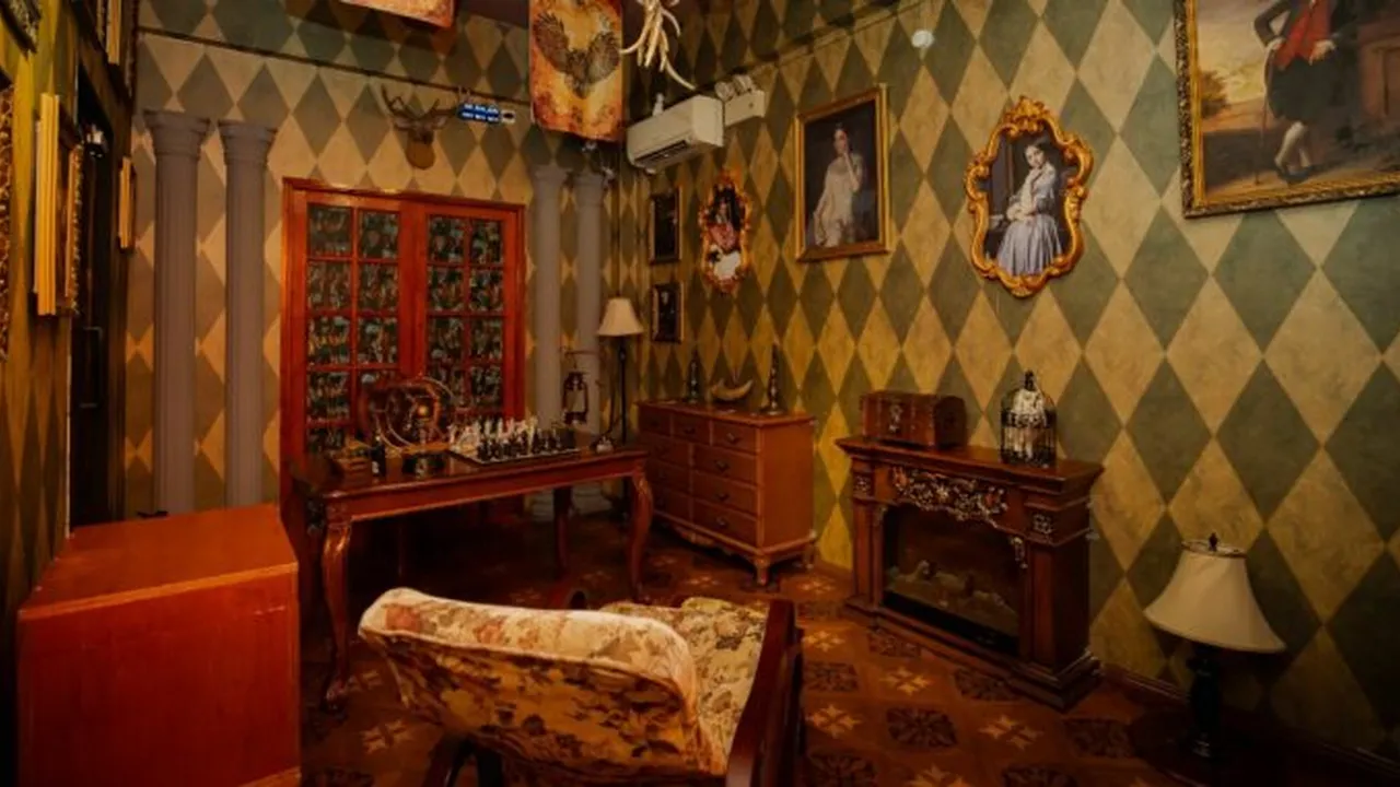 Close up on a plate of mashed potatoes, topped with baked pork chops with cream of mushroom soup, and a side of green beans.